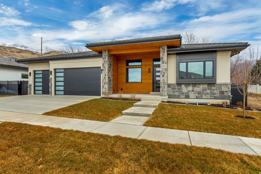 Just Reduced $20,000, Recently appraised at $1,400,000 | Move-In Ready Abbey Road Value + Lifestyle Move-in-ready and built by Whitehaven Builders at the base of Mt. Timpanogos, this Abbey Road home delivers instant value and an easy Utah lifestyle-more time in the canyon, on the trail, or on the slopes, and less time on yard work. -Bright, open main level with 13' vaulted ceilings and a wall of windows framing mountain views -Chef's kitchen with quartz island, Bosch appliance package, gas cooktop, and a walk-in "second kitchen" pantry (2nd sink + dishwasher) -Main-floor primary suite with soaking tub, oversized shower, custom closet, and washer/dryer hookups -Glass-door office for a private work-from-home space -Lower level built for fun + function: family room with kitchenette, tiered theater, glass-enclosed gym with its own climate control, plus two more bedrooms (one ensuite), full bath, oversized laundry, cold storage, and an under-stair nook -Low-maintenance + high-efficiency upgrades: -Finished/insulated 3-car garage with epoxy floors, hot/cold water, EV outlet, smart openers -Dual furnaces, instant hot water, AprilAire filtration -Stucco/stone/cedar exterior + 75-year Bar-Tile roof -Landscaped, fully fenced yard with approx. 0.17 acres limited common area (less to maintain) -$125/mo HOA includes front/back lawn mowing, snow removal (driveway + sidewalks), community green space, and a pickleball court. -Minutes to Harmons, University Place, Provo Canyon, and I-15. -Special Financing Available: Seller financing and/or lease-to-own options may be available-ask for terms and details.