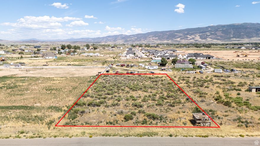 Great potential for storage or to build a home. Located in Iron County.  Address is approximate.  Does not come with water.  If looking to build, buyer would need to provide water, septic, and power.
