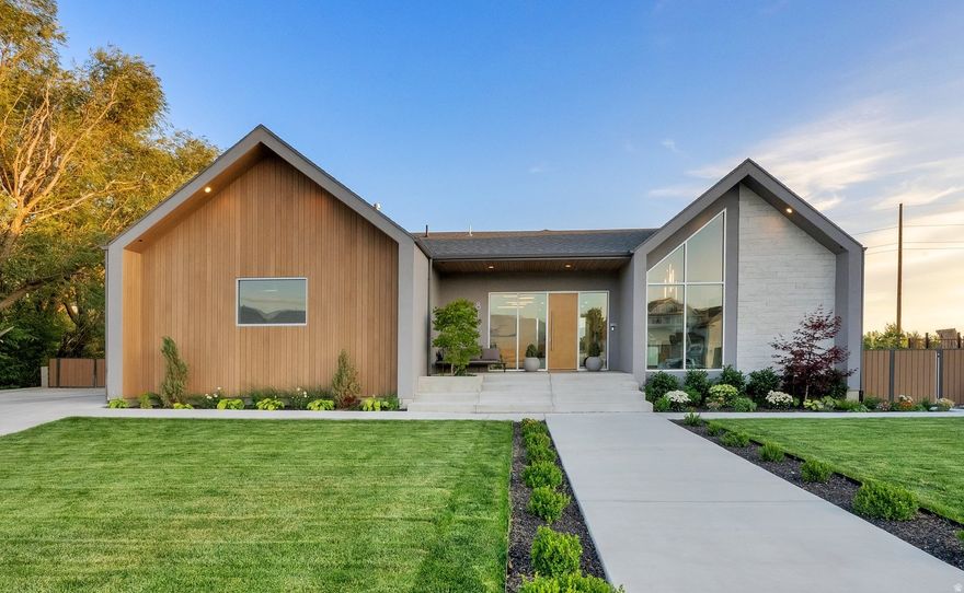 Welcome to this modern contemporary masterpiece-where luxury, comfort, and technology converge in perfect harmony. Located at the end of a quiet non-through street, this stunning home offers maximum privacy while still being just minutes from freeway access, Silicon Slopes, shopping, restaurants, Costco, theaters, and more. Step inside to discover a bright, airy, open-concept main floor with soaring 10-foot ceilings and expansive windows that flood the space with natural light. The gourmet kitchen is a chef's dream, featuring top-of-the-line Thermador appliances and sleek, modern finishes-ideal for entertaining or everyday living. Enjoy seamless indoor-outdoor living with a spacious covered deck, perfect for relaxing or hosting gatherings year-round. The entire home is powered by a premium $148,700.00 Savant Home Automation System, offering unparalleled control of lighting, shades, climate, entertainment (TV's and audio), and security-all from the palm of your hand. This home offers the ease of main-floor living and includes a beautifully appointed and completely furnished one-bedroom accessory dwelling unit (ADU), ideal for guests, extended family, or rental income-generating approximately $1,500 per month. PRICED TO SELL!! Don't miss the opportunity to own this exceptional blend of style, privacy, and innovation. **Buyers, contact me or ask your agent for a full list of the upgrades and features associated with the home. There are too many to list, but a document is attached to this listing for agents to access**