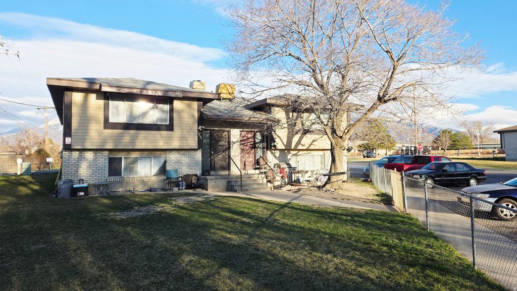 Photo of 8404 S MONROE ST, Midvale, UT 84047 (MLS # 2145102)