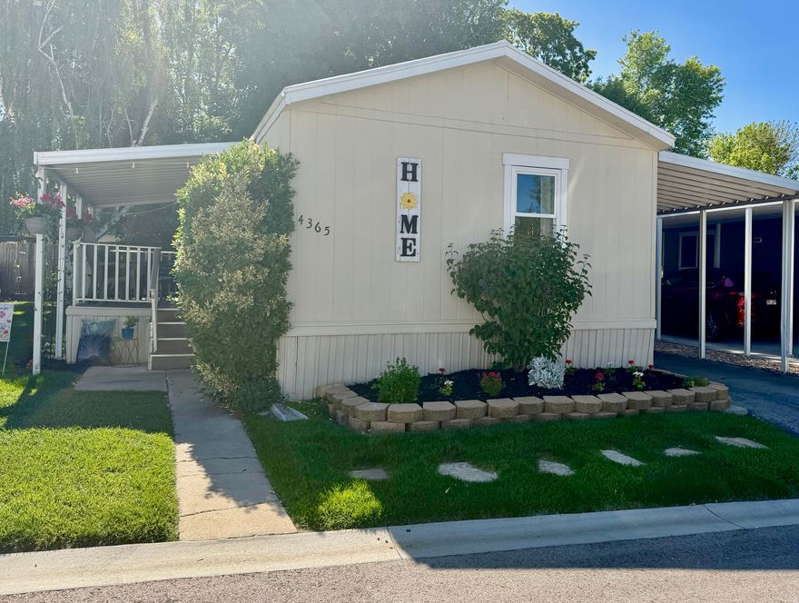 Nestled among shade trees in the beautifully maintained gated 55+ community of Cottonwood Coves, this cozy and inviting home offers comfort, charm, and peaceful community living. Enjoy quiet tree-lined streets, the soothing sounds of Big Cottonwood Creek winding through the grounds, and wonderful neighborhood amenities including a clubhouse and seasonal swimming pool. Inside the home, you'll find a spacious open-concept living and kitchen area with vaulted ceilings that create an airy "great room" feel perfect for relaxing or entertaining. The home features 2 bedrooms and 2 full bathrooms, plus a covered porch/deck ideal for enjoying cool mornings and shaded evenings beneath the mature trees. Outside, there's also a covered carport, two storage sheds, and a private backyard retreat. This well-cared-for home offers a wonderful opportunity to add your own updates and personal touches while enjoying one of the area's most peaceful and welcoming communities. All appliances are included, including refrigerator, dishwasher, washer, and dryer. Pets are permitted. Buyer must be approved by property management prior to ownership.