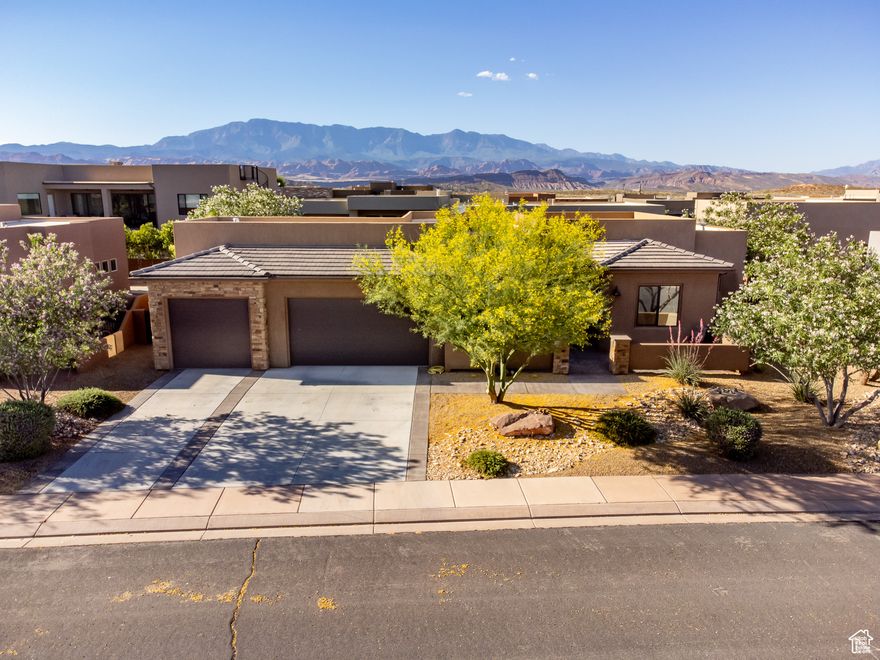 This home is pristine and really shows true pride of Ownership. First the curb appeal with the large courtyard, Next, walk in through the front door into the spacious, open floorplan great for entertaining friends and family with gas log fireplace connected to the spacious chefs kitchen. Other features of the home consists of 4 spacious bedrooms, one even comes equipped with a beautiful murphy bed so the one bedroom can be used for an office space and/or a guest bedroom. Additional features of the home include a large master suite with master bath that consists of separate tub/shower, large walk in closet and high ceilings. Last but not least the home features a large 3 stall garage with above storage, quiet and peaceful back patio and minutes from one of the most awesome resort in Southern Utah as well a the Sand Hollow sand dunes well known for side by side fun and adventures, world known rock crawling events as well as outdoor concerts, wonderful restaurant and the Sand Hollow championship golf course. Call and schedule your own private showing and take the next step in making this your new home. Square footage figures are provided as a courtesy estimate only and were obtained from County records. Buyer is advised to obtain an independent measurement.