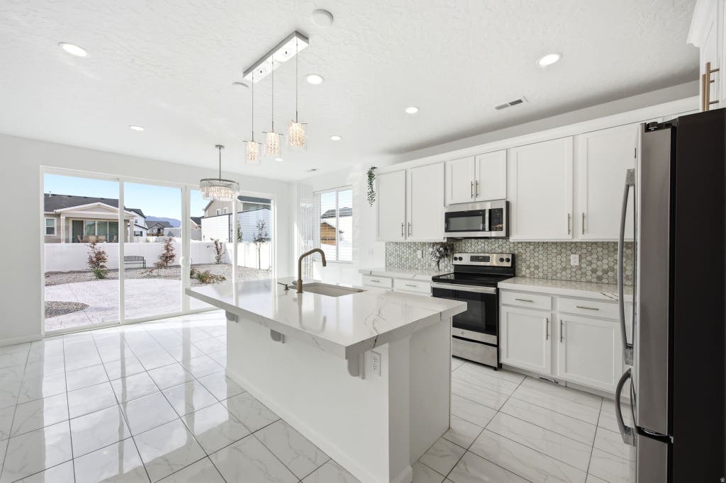 Photo of 431 W PALOMINO WAY, Stansbury Park, UT 84074 (MLS # 2173969)