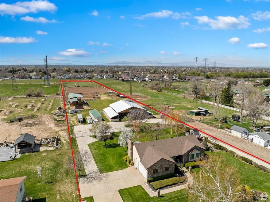 Additional acreage for lease. Well maintained new water heater 7-25. Close to schools, golf course, back yard playground. 10 Stall Horse barn w/electricity, covered hay storage, covered trailer parking. Laundry connection main level and basement. Round pen w/partial cover, hot walker w/sprinkler, Manual sprinkler for pasture. 165'x320' outdoor fenced riding arena w/sprinklers. Covered tractor storage. 7 covered horse runs 9 total. 2 separate Secondary water connections. Buyer to verify all information to their satisfaction.