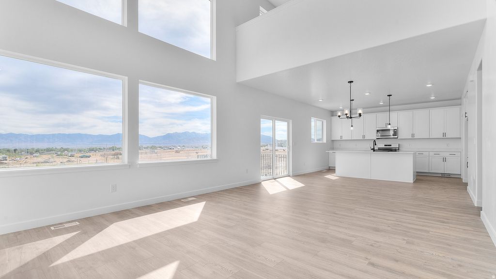 Photo of 4130 N 560 W #004, Erda, UT 84074 (MLS # 2141753)