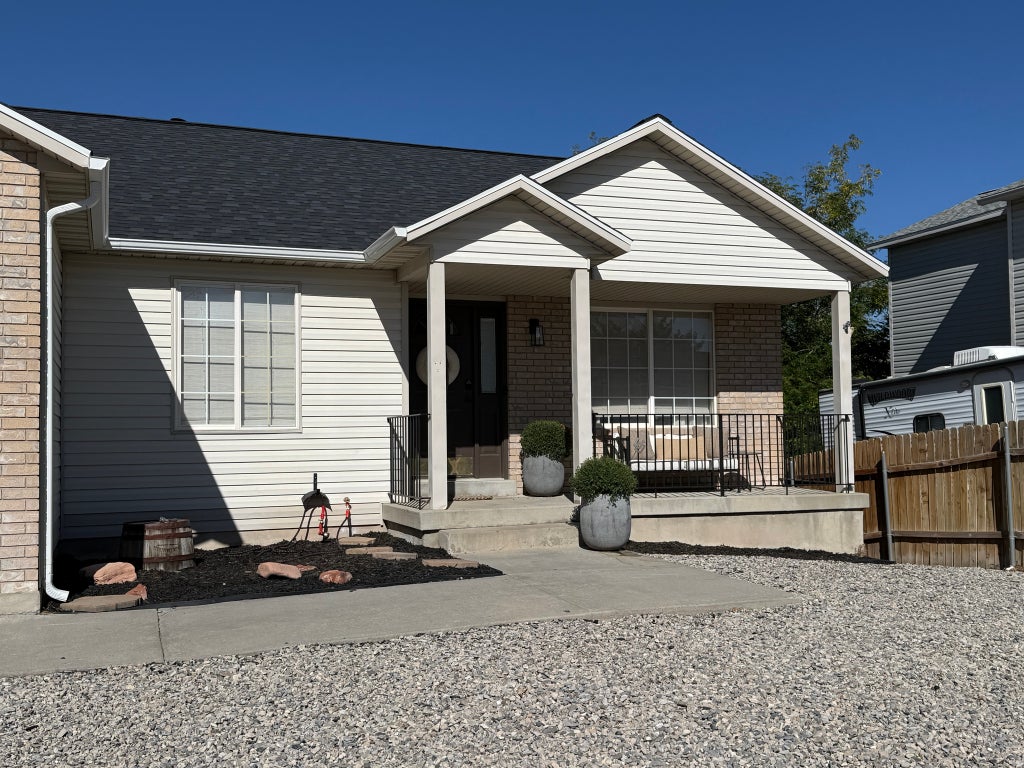Photo of 6437 S HIGH BLUFF DR W, Salt Lake City, UT 84118 (MLS # 2184300)