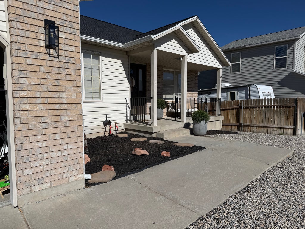 Photo of 6437 S HIGH BLUFF DR W, Salt Lake City, UT 84118 (MLS # 2184300)