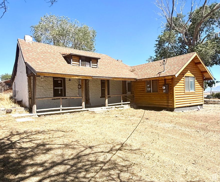 HUGE PRICE IMPROVEMENT! Bring your vision and make this charming 1878 ranch-style home your own! Nestled on 2 acres in the heart of Cedar Fort, this property is already set up for horses with fencing, barn, and sheds in place- perfect for anyone wanting a little country lifestyle. Tons of space for vehicles and trailers for horses.  The home features 2 bedrooms, 1 bath, and over 1,500 sq ft, with original character throughout. It does need some finish work- such as new trim, baseboards, and interior doors- but provides a solid foundation with tons of charm to build on.  In addition to being move-in ready for horses, the property also offers the option to subdivide an additional lot along the side, giving buyers flexibility for a future build, investment, or expanded family use.  Outside, you'll find wide open land with a barn, sheds, and irrigation water shares- perfect for animals, gardening, or future improvements. Enjoy peaceful mountain and valley views and plenty of room to expand or customize.  With no HOA and just a short drive to city conveniences in Eagle Mountain or Saratoga Springs, this property offers the best of both worlds: rural living with easy access to town.  Whether you're looking for a horse property, investment project, or country escape, this one-of-a-kind property is full of possibilities.