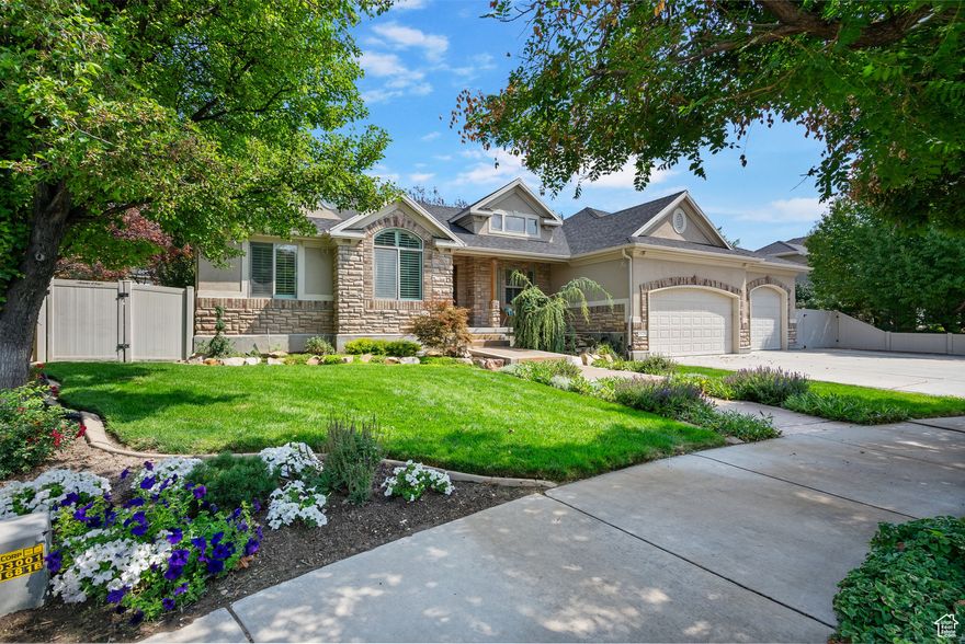 Seller is offering $15K CONCESSIONS on this BEAUTIFUL home located in Ivory Crossing subdivision on a quiet and friendly cul-de-sac. Outside the home you will find a beautiful water feature, NEW roof 8/25, permanent lighting, large covered patio, and private fire pit area. Extra deep garage has tons of storage space. The oversized RV parking area is the full length of the yard. BONUS possibility to add a walkout basement to allow for extra income. Inside you will find 2 furnaces, new paint, new carpet, central vac and beautiful tile inlaid floors. The skylights are AMAZING and add so much natural light. Large kitchen and dining area with open concept living and a fireplace. Basement features a LARGE room for exercise, office or another bedroom. Playhouse under the stairs and a builtin entertainment center. This home is truly a beautiful oasis and has everything you could need.