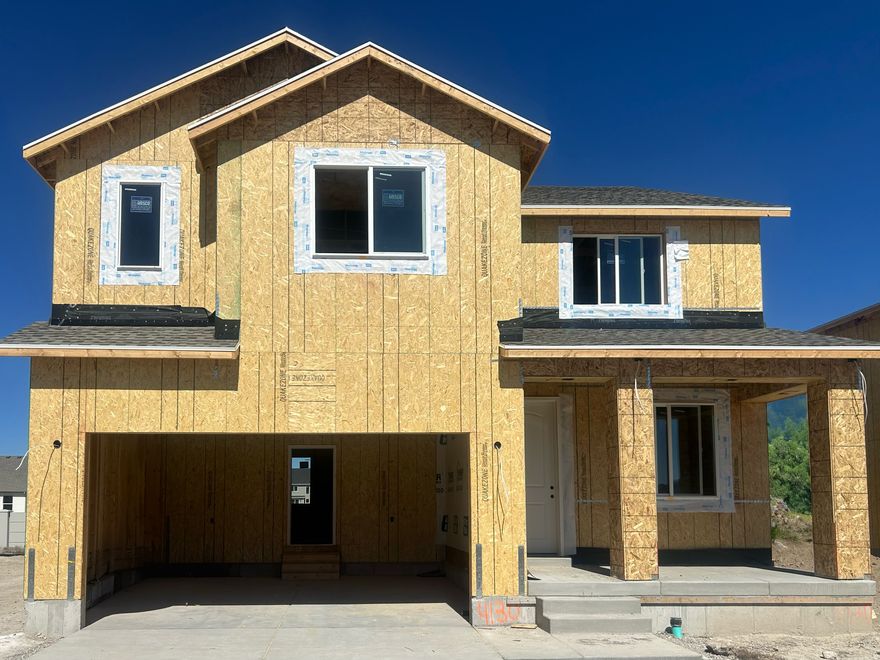 Parkway Fields - 4130 - Mesa. ESTIMATED COMPLETION IN MAY. Offering up to $20,000 towards closing costs or ask about our rate buydowns when financing with our preferred lender. This home offers 4 bedrooms, 2.5 bathrooms, a 2-car garage, and a full, unfinished basement. The first floor offers a formal living room, a large family room, and a kitchen that boasts white craftsman-style cabinets, pale gray quartz countertops and stainless steel appliances, including the refrigerator! Upstairs you'll find 4 bedrooms, including the luxurious owner's suite with walk-in closet and a bathroom with dual vanities. Square footage figures are provided as a courtesy estimate only and were obtained from builder. Buyer is advised to obtain an independent measurement. Interior photos are of same style of home, but not the actual home. Rendering is for illustrative purposes only.