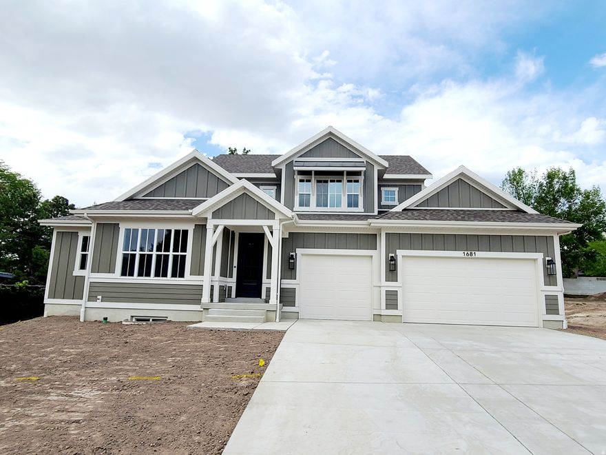 This beautifully moden Edison home offers a perfect blend of modern luxury and timeless charm. The gourmet kitchen features Bluff Maple cabinets with LED lighting, Quartz countertops, Cafe Stainless Steel Gas appliances with double ovens, and a stylish tile backsplash, all highlighted by a box window in the kitchen nook and an atrium door for seamless outdoor access. The spacious Great Room is centered around a cozy gas log fireplace, with can lighting enhancing the ambiance. The luxurious Owner's Suite boasts a box window and a spa-like bath with tile surrounds and bronzed gold hardware. Throughout the home, you'll find durable laminate hardwood flooring, soft carpet in the bedrooms, and pristine tile in wet areas. An expanded garage with an exit door, French doors leading to the office, textured walls, two-tone paint, and Roosevelt base and casing add sophistication and functionality. Additional features include Christmas light outlets, gas lines to the dryer & BBQ, a radon ventilation system, and a gas log fireplace in the Great Room, making this home the ideal blend of comfort and style.