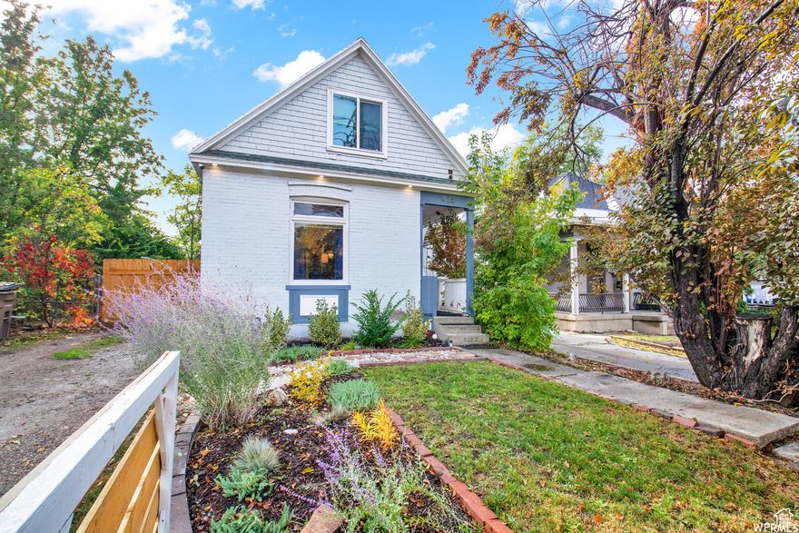 Check out this hip and fully updated two-story, situated just minutes from downtown Salt Lake City and walkable to Harvey Milk Blvd with all the amazing restaurants, coffee shops, deli's, shops and more! This 1903 home was fully renovated in 2019 and includes all the updates you're looking for. The main level includes an open concept floor plan with high ceilings and tall windows, letting in all that fantastic natural light. The kitchen boasts stainless steel appliances, 3" quartz countertops, soft close cabinets and stylish floating shelves. Hardwood floors throughout the main level as well as recessed lighting, designer paint, custom lighting fixtures and stylish window coverings. The living room is elegant with a custom wall treatment and modern low profile fireplace. Main level bedroom is small and could be an excellent home office. The upper level includes two bedrooms, a large en-suite bath with customer vanity and convenient laundry. HVAC is newer and pex piping throughout. The fully fenced backyard is spacious with large trees, garden space, shed for storage and charming outdoor stone fireplace. There is also access to the yard with an automatic gate. The location can't be beat.  The property must be sold with the parcel 16-07-253-032. Showings will begin at Open House on Saturday September 20th from 11-1pm.