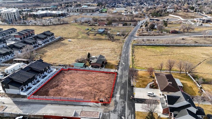 Rare 0.40-acre custom homesite in South Jordan with stunning mountain views and an elevated position overlooking the Jordan River corridor. Located on a quiet street, this spacious lot provides the perfect setting to design and build a custom home tailored to your vision. Enjoy nearby trails, parks, shopping, and convenient access to amenities. Most utilities are stubbed to the lot; sewer is located in the road