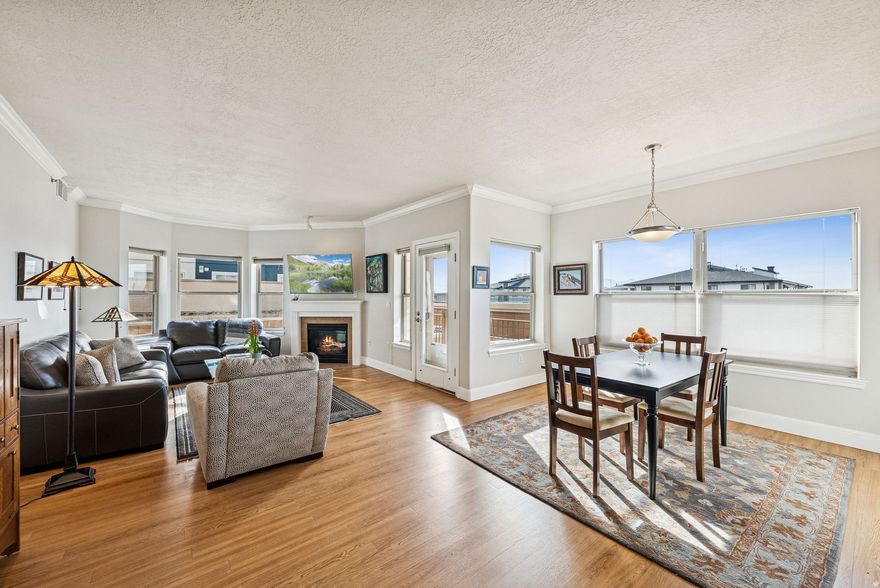 Move-in Ready Gateway Condo with Sunset views and Expansive Terrace Access. This beautifully maintained 2 bedroom 2 bath condominium offers 2 private decks that open directly onto the shared terrace, with west facing views and a rare sense of open space in the heart of the city. The unit features hardwood floors, granite countertops, a gas fireplace and a fabulous open floor plan that is ideal for entertaining. Enjoy the convenience of  the washer and dryer in the unit, large walk in closets, 2 additional storage spaces plus two secure garage parking spots. The Parc at Gateway offers exceptional amenities including a club room, exercise room, and secure access. Experience the best of downtown living within walking distance to the Delta Center, Abravanel Hall, coffee shops and grocery stores.  The Salt Lake International  Airport and the University of Utah are 15 minutes away while world class ski resorts can be reached within 45 minutes. Square footage figures are provided as a courtesy estimate only. Buyer is advised to obtain an independent measurement.