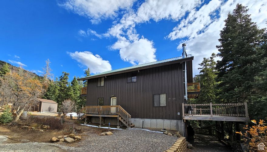 Big family cabin right next to Twin Creek with mature pine trees and aspens. Oversized Trex deck for all to gather and enjoy the beauty of the mountains as you listen to the water cascading down the creek.  Set on a dead-end road so no through traffic. This property comes fully furnished and ready to use today. New roof installed this summer. Do you have a big family and lots of friends? Bring them all as this cabin has plenty of space. The master suite could easily be split into two spacious bedrooms for a total of four bedrooms on the main and 2nd floor. The basement is a blank slate and can be finished any way you want.  The main level has a big open layout that flows onto an oversized deck looking over the creek and mountains. Upstairs is a large open living/family room space with a 3rd floor loft for a children's play area. Escape to your very own dream cabin with its own creek. You will create memories and moments that last a lifetime as you get away from it all and enjoy the cool, crisp mountain air and star lit nights that only the mountains can offer.  Could be a fantastic short term rental property to generate income when you're not using it. Year-round outdoor activities, no matter your interest. Whether it is hiking, mountain biking, ATV/side-by-side exploring, fishing, hunting, water sports, rock climbing, cross-country skiing, snowshoeing, tubing/sledding or snowmobiling, you will find outdoor activities to enjoy. Easy access to the Manti-La Sal National Forest and all that the Skyline Drive has to offer, including over 600 miles of the Arapeen ATV/OHV Trail await you. Minutes away you will have access to the small-town charm of Mt. Pleasant, Spring City and Fairview with amenities such as an indoor rec pool, grocery and hardware stores, hospital, arts activities, restaurants and even a drive-in theater. Winter access is by tracked vehicles only. Personal items are excluded. Elevation is 7,235. Google Maps is 39.48999, -111.39195. Buyer to verify ALL information.