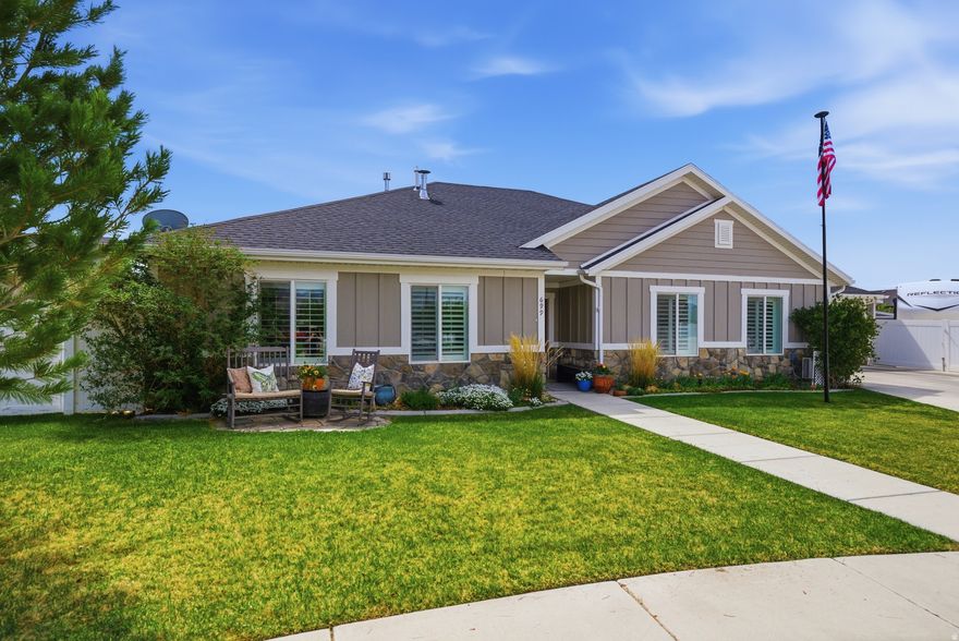 {GRAND OPEN HOUSE SATURDAY April 11th from 11AM-1PM}. Immaculate, sun-filled Craftsman-style home that blends charm, quality, and functionality with easy one-level living. This beautifully maintained residence features vaulted ceilings throughout, including all three bedrooms, creating an airy and spacious feel. The open-concept main living area is perfect for both everyday living and entertaining. The kitchen is thoughtfully designed with custom cabinetry, granite countertops, a center island + two pantries. Just off the main living space, the home opens to a large back patio ideal for outdoor dining, gatherings, or simply relaxing in your fully fenced and landscaped backyard. A backyard gazebo, already wired for a hot tub, is the perfect place to sit back, relax, and take in the mountain views. An additional great room offers exceptional flexibility; whether as a second living space, home office, or media room. You'll also appreciate the quality details throughout, including plantation shutters, updated flooring, and recessed lighting. The home is wired and plumbed for both gas and electric appliances, including the kitchen range and dryer. Completing the package is a finished extra-large third-car garage (30x16), attached 2-car garage (24x24) and dedicated RV parking (potentially up to 35ft - currently a 27ft 5th wheel fits easily with the gates closed). This is a rare opportunity to own a move-in-ready home in one of Springville's most desirable locations + the new Buc-ee's!