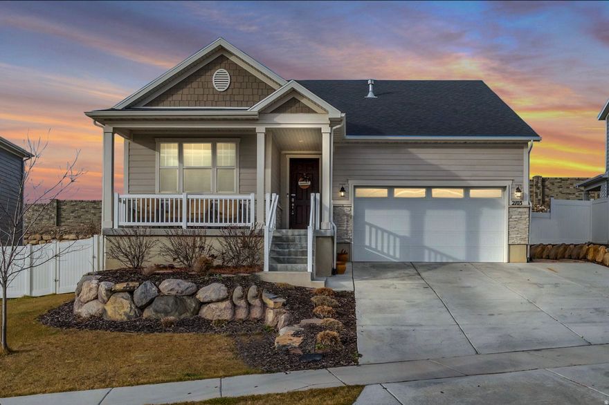 Welcome to this inviting single-level home located in the Wildflower community of Saratoga Springs. The open floor plan offers stylish Quartz countertops, a spacious kitchen island, and a warm gas fireplace-perfect for everyday living and entertaining. The primary suite includes a walk-in closet and a sleek frameless glass shower. Enjoy peaceful mornings on the covered front porch with beautiful lake and mountain views, or relax on the extended back deck. The community features nearby trails, a dog park, playground, and exclusive access to a residents-only reservoir, a standout amenity that adds to the lifestyle appeal of this home.