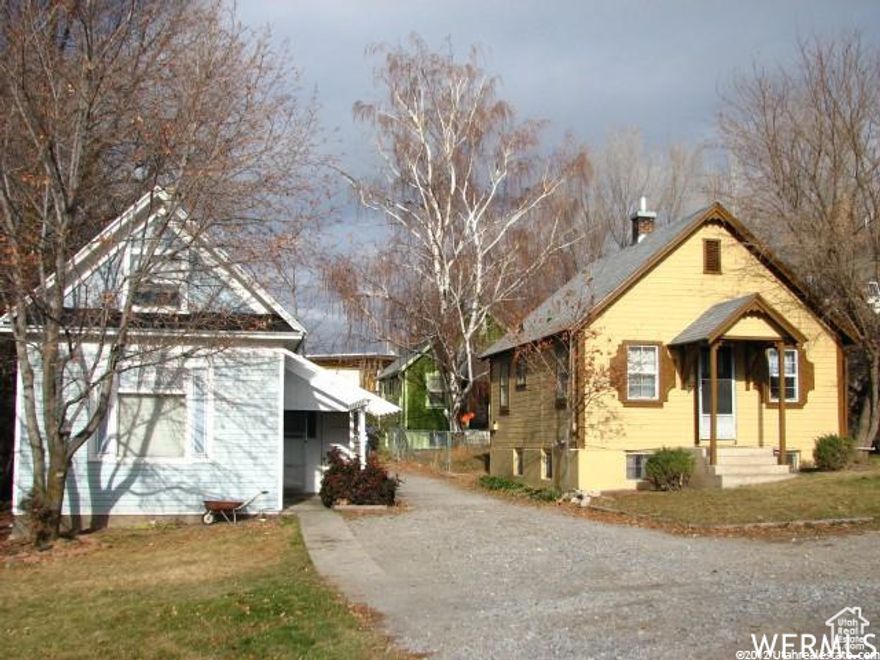 LOCATION - LOCATION - LOCATION!  1/2 block west of Utah State University.  Includes 3 buildings on .27 of an acre in high density area.  Currently 2 duplex units and a 4 bedroom home.  Most of the parking in the rear.
