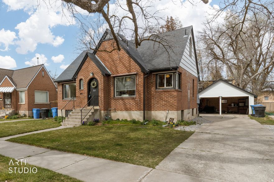 Welcome to this charming Logan gem! Nestled in the heart of Logan, this beautifully maintained home perfectly blends timeless character with modern updates. Step inside to a bright, open living space filled with natural light, warm hardwood floors, and an inviting, cozy feel - perfect for relaxing or entertaining. The updated kitchen features sleek cabinetry, stylish tile flooring, and modern appliances, making it both functional and visually appealing. Upstairs, you'll find a spacious attic bedroom retreat with vaulted ceilings and generous closet space. Making it an ideal private escape. Adding incredible value and flexibility, this home also features a basement apartment with its own kitchen, bedroom, and bathroom. This provides space for a perfect rental, or room for extended family, or guest accommodations. Outside, enjoy a large backyard perfect for gatherings, play, or gardening, along with a detached garage and a welcoming front porch that adds to the home's curb appeal. Conveniently located near parks, schools, and shopping, this home offers the perfect balance of comfort, style, and accessibility. Don't miss your chance to own this versatile and delightful Logan property!