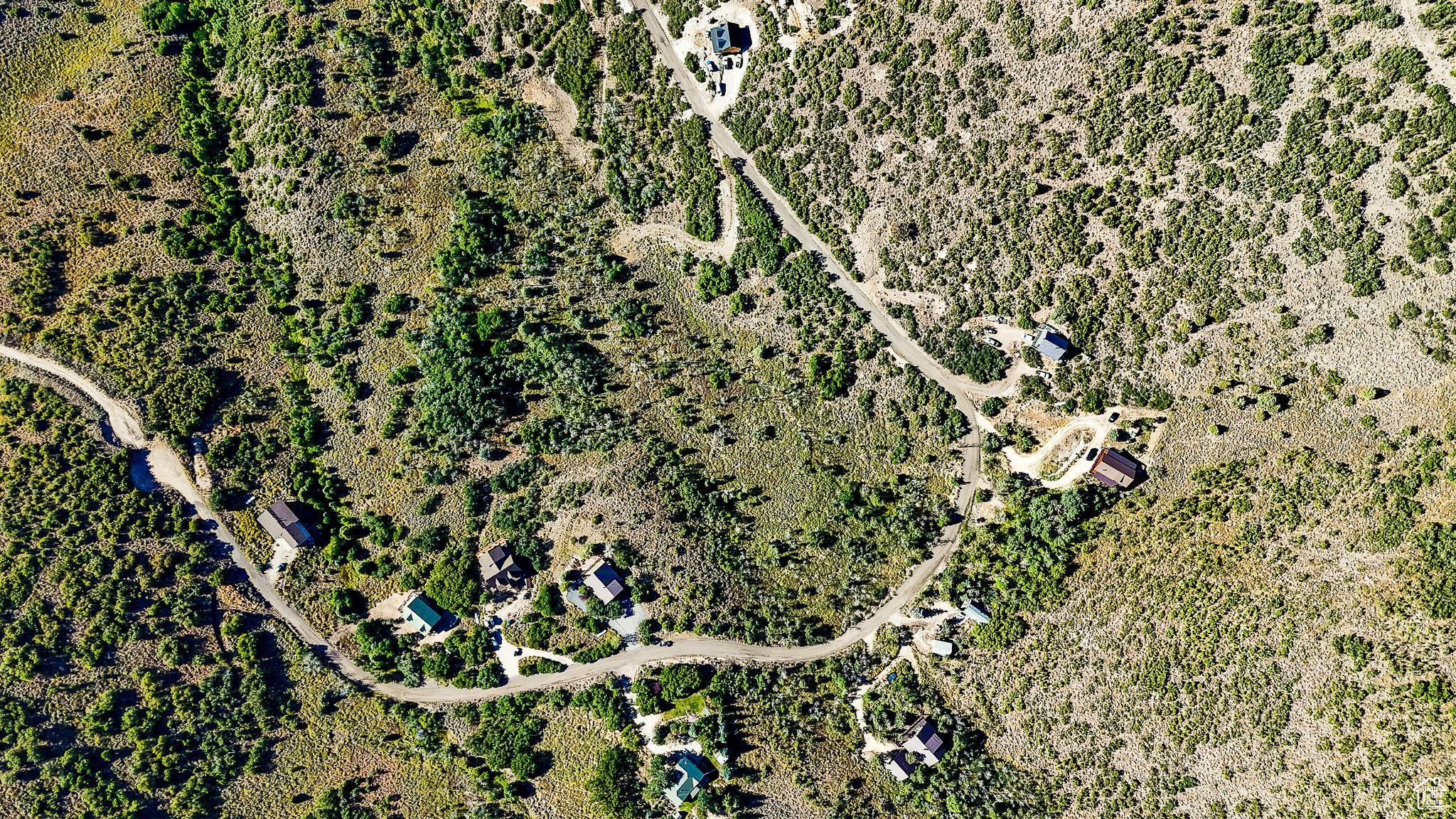 Discover 4.29 acres of one-of-a-kind alpine terrain in the sought-after Timber Lakes gated community. This rare, west-facing parcel offers an unparalleled blend of views, privacy, natural beauty, and year-round recreational access, making it the perfect location for your dream mountain retreat. Framed by the soothing rustle of aspens and breathtaking Wasatch Mountain views, the property provides multiple potential build sites to capture stunning sunsets and star-filled night skies. Timber Lakes is renowned for its four-season lifestyle, offering nearby access to miles of private trails for hiking, mountain biking, snowshoeing, and cross-country skiing. In winter, explore snowmobile routes that connect to the extensive Uinta National Forest trail system. In summer, enjoy fishing in stocked lakes, paddleboarding, and wildlife watching right from your backyard. Just minutes from Heber City's shops, dining, and golf courses-and a short drive to world-class skiing in Park City-this property offers the perfect balance between seclusion and convenience. Whether you envision a cozy cabin getaway or a grand lodge for family gatherings, this lot provides the space and setting to bring your vision to life. Experience the ultimate mountain lifestyle - where adventure begins at your doorstep! Lot lines in listing photos are provided as a courtesy and are not exact, please obtain your own measurements.