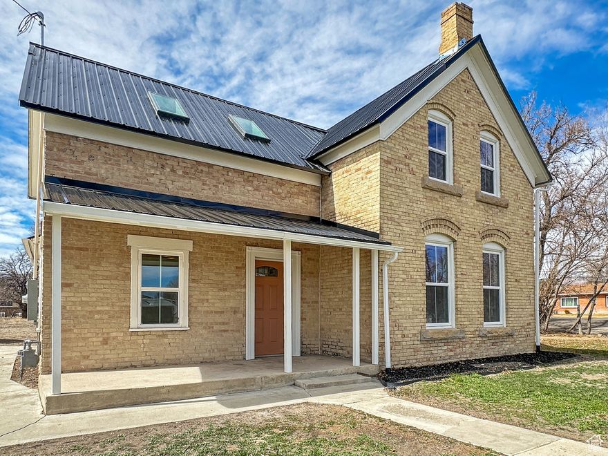 A Historic Gem made new with modern decor and conveniences! Built in 1910, every surface of this house has been painstakingly restored or replaced. 1,810 square feet in 2 stories. 3 bedrooms, 2  baths, kitchen, living room, plus laundry room. New plumbing, new electrical, new steel roof, new double-paned windows. New central air and heat. New kitchen appliances and fixtures throughout. The kitchen is a show piece. Many of the historical features have been repurposed or restored to new life. The ceiling panels were cut from the original 115 year old floors. The house sits on 1/3 of an acre, and has a 100 year old 16ft x 20 ft storage shed with new matching roof. Ready to move in! Square ft was taken by owner.  County does not have record of sq ft.  Buyer to verify.