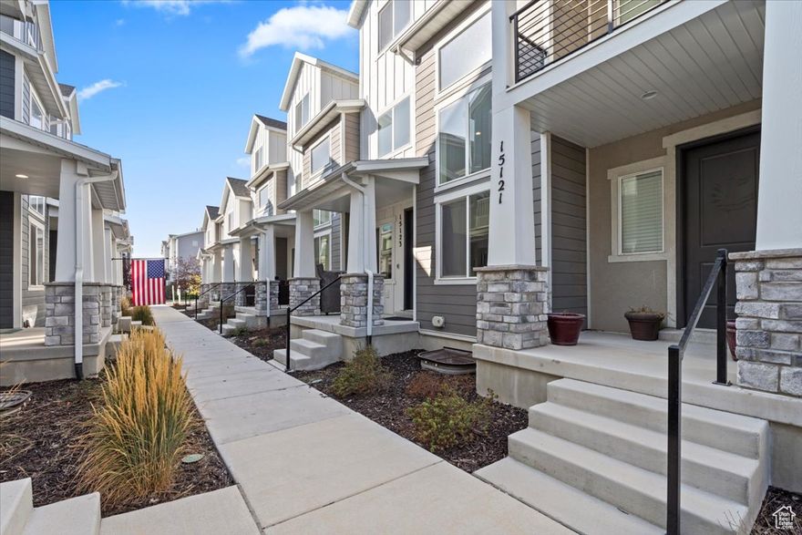 Welcome to this stunning townhouse in the heart of Bluffdale, built in 2022 and still in like-new condition! Enjoy an abundance of natural light throughout the home, thanks to large windows that create a bright and inviting atmosphere.  Upgrades include: Soft close cabinets in kitchen and bathrooms, double sinks in master bathroom, upgraded master closet shelving, ceiling fans in master/loft/3 upstairs bedrooms, double oven upgrade, electronic car charger in garage, dedicated outlet in garage for freezer, 50 gallon water heater, pre plumbed for soft water in basement and pre plumbed bathroom in basement.   Nestled in a well-maintained community with access to biking and walking trails, a neighborhood playground, and open green spaces-perfect for active lifestyles and outdoor enjoyment.  Conveniently located just minutes from I-15 for easy commuting, and a short distance from the future site of The Point-a premier development set to offer shopping, dining, entertainment, and access to a beautiful river trail. Walking distance to elementary and junior high. Square footage figures are provided as a courtesy estimate only and were obtained from county records .  Buyer to verify all.