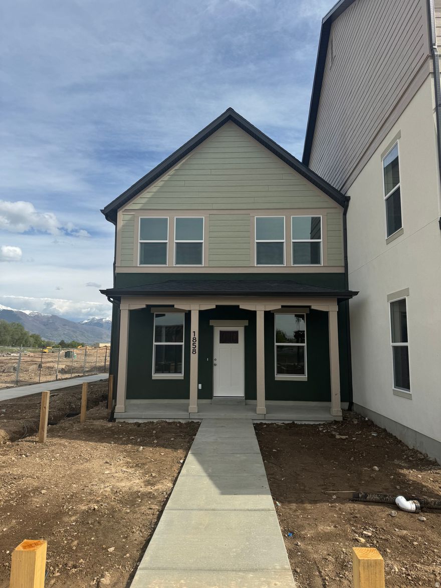Arlington floor plan at Trailside community. Gourmet kitchen with upgraded cabinets, quartz countertops and stainless steel appliances. Trailside community features a hammock park, playground, paw park, bike and walking trials! Financing incentive with preferred lender. Visit our model home at 1839 W 1150 N, Layton, UT 84041 Mon-Sat, 11 AM - 6 PM.