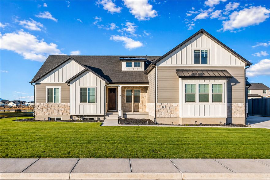 No other home like this. Loaded with upgrades and showing like a model, this newer rambler with a large bonus loft is located directly across from the private lake in the gated Pier community, just 28 minutes from Downtown Salt Lake City. The current owner has only occupied the home very part-time over the past few years, and it truly looks and feels brand new. This gorgeous custom home offers 3 bedrooms, 3 bathrooms, a dedicated office, and a large loft that can be used as an additional bedroom, second living area, playroom, or flexible bonus space. High-quality finishes are featured throughout, including a gourmet custom kitchen with gas cooktop, hood, and double ovens, three-tone paint, a custom fireplace with stone and hearth, tile flooring and surrounds in all bathrooms, and numerous designer upgrades. The spacious owner's suite includes a freestanding tub, separate shower, and a large walk-in closet. Additional highlights include a covered patio, fully landscaped yard, and countless upgrades inside and out. Enjoy resort-style living in the private, gated Pier community with easy walking access to the lake, biking and walking paths, a wakeboarding system, lake activities, and an aqua playground. Outdoor enthusiasts will also love being minutes from pickleball courts at Porter Way Park, nearby parks, and Stansbury Park Golf Course, along with the community's popular Food Truck Thursdays. Ideally located near schools, approximately 10 minutes from the brand-new Deseret Peak High School, close to the Tooele Temple, and just minutes from major retail growth at The Peak at Compass Point, anchored by Smith's Marketplace. Founders Pointe continues to expand with shopping and dining options including Hobby Lobby, Five Below, Chipotle, Chili's, with Ulta, Ross, TJ Maxx, and Old Navy currently under construction. With quick I-80 access and a prime location in one of Tooele County's most vibrant and fast-growing communities, this home offers an exceptional blend of luxury, lifestyle, and convenience.