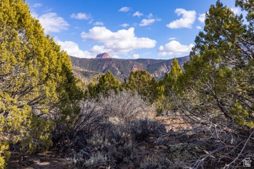 Highlights of this 5-acre lot: 1. The soils work has been done. Custom house plans included. 2. Breathtaking views of Pine Valley mountains to the west and Zion National Park to the east. 3. Located in a unique equestrian community where all homes are on 5 acres. 4. All utilities; 1 acre share of water, natural gas, electricity, fiber optics internet, paved roads. 5. conveniently located just minutes to St George or Cedar City.