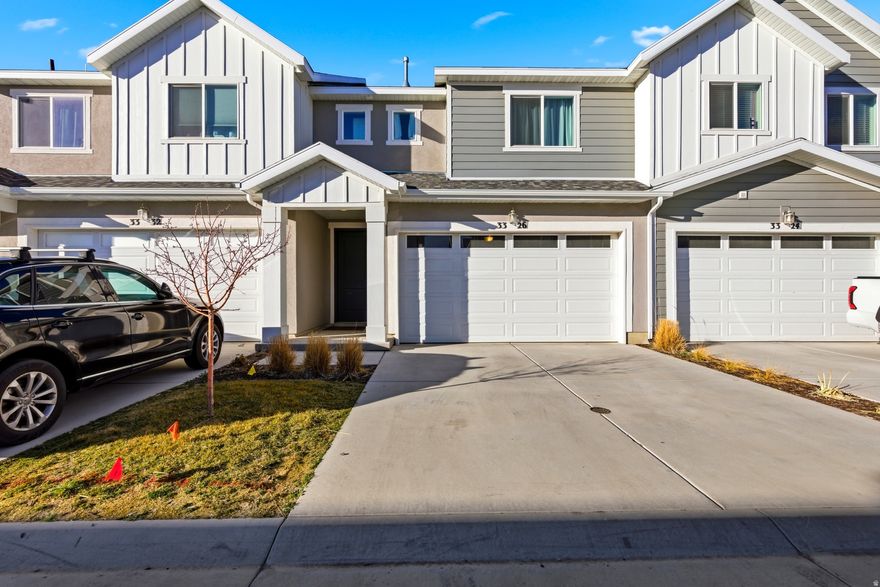 Welcome to this beautifully maintained 2023-built townhome in West Haven, Utah offering the perfect blend of modern style and low-maintenance living. With 3 spacious bedrooms and 2.5 bathrooms, this home provides functional space for everyday comfort and entertaining alike. The bright, open-concept main level features a stunning kitchen complete with granite countertops, updated stainless steel appliances, ample cabinetry, and generous prep space - ideal for hosting or weeknight dinners at home. The seamless flow into the living and dining areas creates an inviting atmosphere filled with natural light.  Upstairs, you'll find well-sized bedrooms including a comfortable primary suite with a private bath and walk-in closet. Thoughtfully designed for convenience, this home also includes a private driveway, 2-car garage, and a fenced backyard - perfect for relaxing, pets, or summer gatherings.  Located in the sought-after Salt Point Northwest Townhomes community with easy access to schools, parks, shopping, and commuter routes, this nearly-new townhome offers modern finishes without the wait of new construction.  Schedule your private showing today.  Buyer to verify all info.