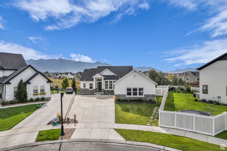 Welcome to 251 S Chardonnay Circle, a move-in-ready home with everything you've been looking for! Tucked away in a quiet cul-de-sac and backing onto preserved city land with walking paths, this property offers rare privacy alongside sweeping views of the Wasatch Front mountains.  The main home is well-cared for and turnkey, with an open layout perfect for modern living. What sets it apart is the newly finished legal ADU-a 2-bedroom, fully self-contained apartment with its own private entrance. Whether you're looking to "house hack" by offsetting your mortgage or create a multi-generational living setup, this space offers incredible flexibility and immediate rental potential.  Surrounded by Vineyard's new homes and growing community amenities, you'll enjoy the blend of neighborhood charm and future upside. With trails, parks, and Utah Lake just minutes away, this home truly delivers the best of Utah living-privacy, convenience, and opportunity.