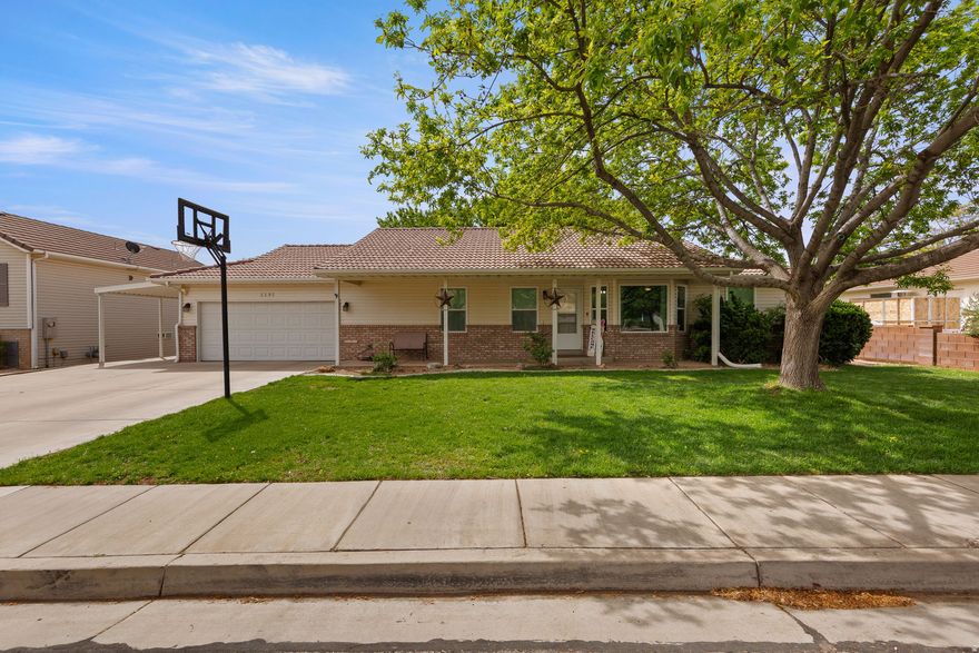 Well-maintained 3-bedroom, 2-bathroom home in an unbeatable location. Thoughtfully updated throughout, this single-family home features LVP flooring, newer windows, and a water heater and water softener. The garage includes epoxy flooring, and an additional carport provides extra covered parking. Enjoy a large fenced yard with mature trees and two storage sheds - plenty of space to spread out. Walking distance to schools, parks, and shopping. No HOA.