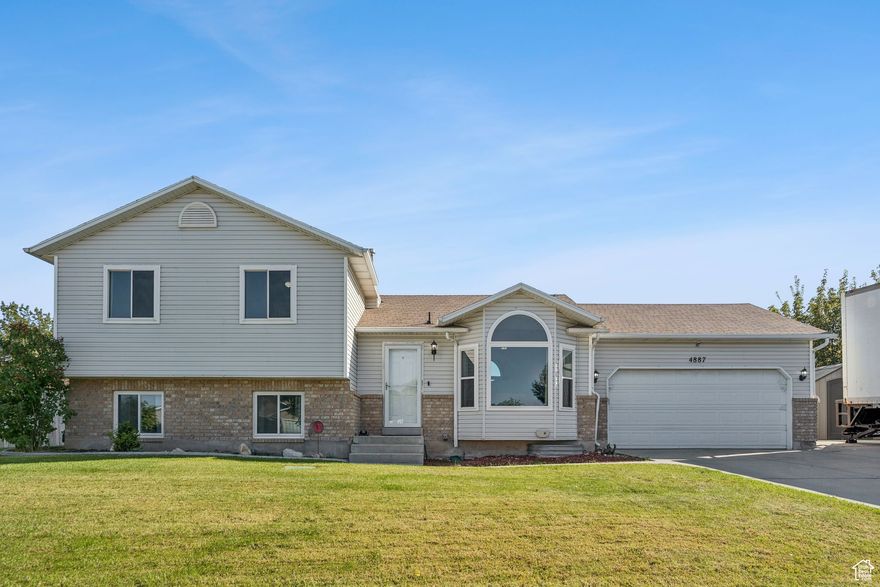 This well-kept West Jordan home features 5 bedrooms, 2.5 bathrooms, 2 family rooms, a formal living room, and RV parking. The home has been lovingly maintained and is very clean throughout! Recent updates include LVP flooring and carpet, a newer furnace and water heater, fully paid-off solar panels, plus brand-new windows installed in 2023. Conveniently located just minutes from Glenmoor Golf Course, parks, shopping, and entertainment. The spacious yard and multiple living areas make it perfect for gatherings both indoors and out.