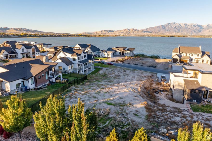 Prime Wiltshire Estates Lot! Discover the perfect setting for your dream home in this luxury Saratoga Springs community. This .440-acre lot offers stunning lake and mountain views, surrounded by beautiful custom homes in a peaceful neighborhood. Enjoy top-notch community amenities and a location that combines elegance, comfort, and family living. Square footage figures are provided as a courtesy estimate only and were obtained from County Records . Buyer is advised to obtain an independent measurement.