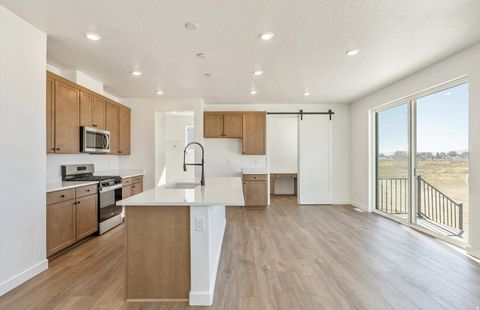 Photo of 4948 N TOPAZ DR #319, Eagle Mountain, UT 84005 (MLS # 2132581)