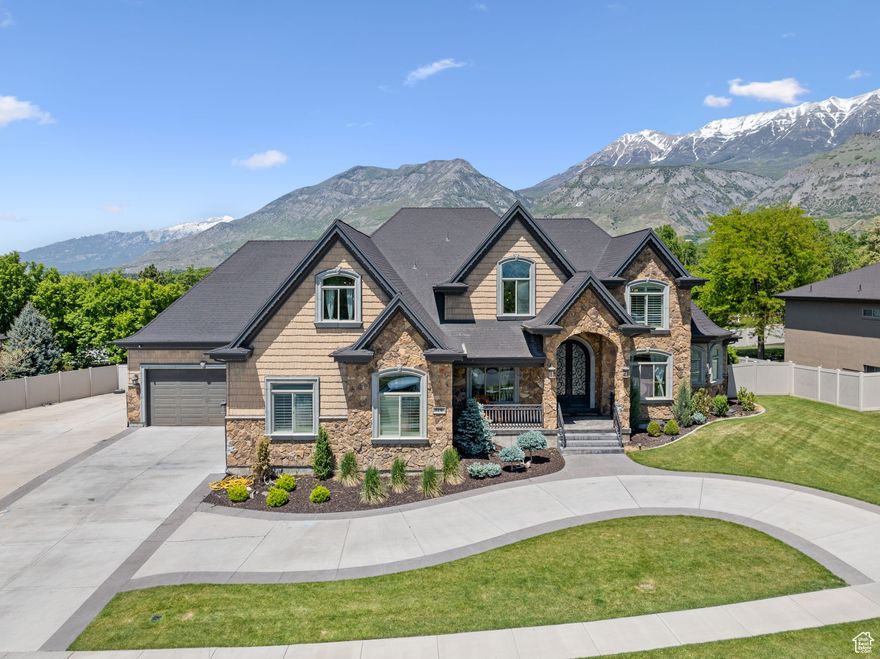 Stunning custom home, perfectly situated in an incredible location on nearly a half-acre lot. This spacious property features a fully fenced backyard with plenty of room to play, garden, or even add a pool-plus space to park your RV or boat. Inside, you'll find a bright, open layout with high ceilings, large windows, and elegant finishes throughout. The grand living room includes a beautiful stone fireplace and built-in shelves, creating the perfect space to relax or entertain. The gourmet kitchen is a chef's dream, complete with granite countertops, double ovens, and detailed cabinetry. There is also a second kitchen in the basement for a possible mother-in-law apartment. With a large driveway, mature landscaping, and room to grow, this property combines luxury and function in one of the area's most desirable neighborhoods.Square feet as per County.  Buyer and Buyer's Broker to verify all information including square footage and acreage.