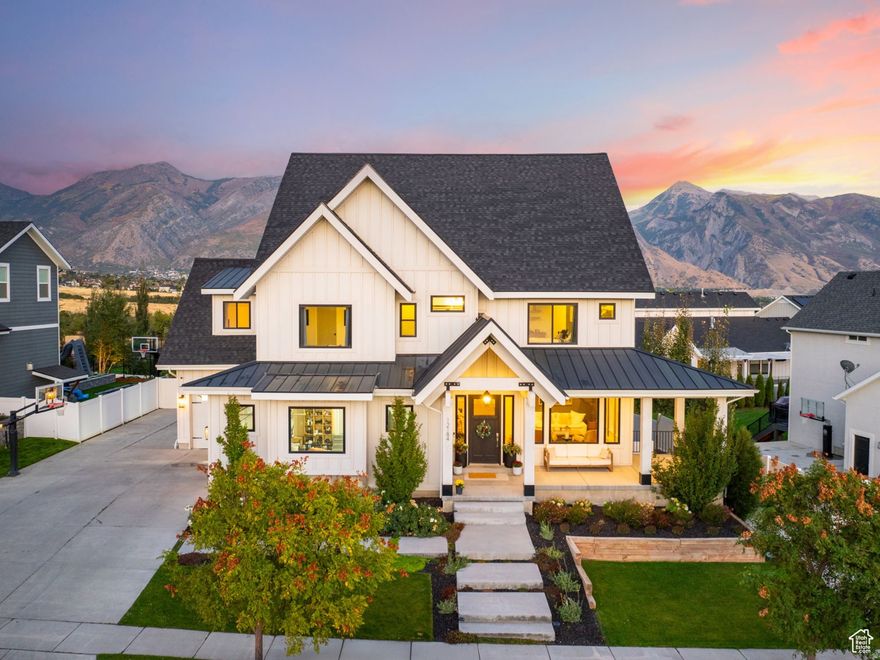 An absolutely stunning home in the most popular Highland neighborhood  Skye Estates! This custom home was flawlessly designed and has top of the line finishes such as engineered hardwood floors, decorative coffered ceilings, a double kitchen island, 4 ovens, and an open butler pantry. The primary bedroom has a private balcony with one of the most breathtaking views in Utah County and the bathroom is paired with a massive walk-in closet. The basement offers a theater room, play area and separate mother-in-law apartment for additional rental income. The home is constantly requested by filming companies for content where they pay the owner for access which is an added perk for extra income! Outside, you'll find another balcony overlooking the huge grassy and fenced-in yard with incredible mountain views. And just a few blocks away sits the community pool that comes in clutch during the summertime. You deserve this home! Call/text Mike Gooch whenever for a private tour!