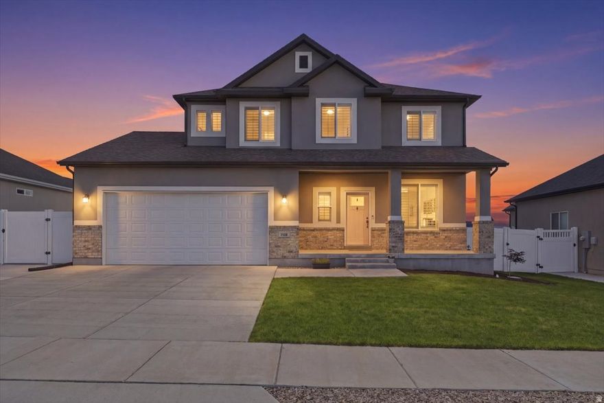 Welcome to this fully finished home nestled in the desirable and quiet Overlake neighborhood of Tooele Valley. With six bedrooms and 3.5 bathrooms, this home offers ample space for a large family or guests, and the 3-car tandem garage provides plenty of room for parking, storage, and overhead storage to keep everything organized. One of the standout features of this home is the cold storage located under the porch, perfect for storing perishable items. The fully landscaped and fenced yard is equipped with a sprinkler system to keep everything lush and green, while the extra-wide driveway includes an RV pad on the side of the house, ideal for storing all your toys and recreational vehicles. Step out back and enjoy a large yard with unbeatable mountain and sunset views, no back neighbors, and all the privacy and tranquility you could ask for. The views of the Deseret Peak Temple, just three blocks away, are simply stunning. The location could not be more convenient. Walking distance to the junior high, elementary school, and the newest high school in the valley. Quick access to SR-36 makes commuting a breeze, and the hospital and shopping are all nearby. No HOA means no restrictions on how you enjoy it all. Included with the home are the refrigerator, Ring video doorbell, and an in-ground trampoline. Please note the basement bedroom adjacent to the cold storage does not have a closet and has previously been used as an office. Tooele is one of Utah's fastest growing communities and the timing to buy here has never been better. The brand new Founders Pointe retail center brought in Chipotle, Chili's, Hobby Lobby, Ulta, Ross, TJ Maxx, and more, attracting nearly a million visitors within its first two months and ranking among the top 50 neighborhood retail centers in the nation. A new Smith's Marketplace recently opened nearby along with Beans and Brews, Einstein Bagels, and Jersey Mike's. Developer Cole West has also announced Echo, a 1,260-home master planned community coming to Erda with single family homes, townhomes, and community amenities, further cementing Tooele Valley as one of Utah's most exciting growth corridors. All of this just 30 miles from Salt Lake City, with breathtaking mountain and Great Salt Lake views, no HOA, and room for everything you need. This one checks every box. Come see it in person and you will understand why homes like this do not last long.