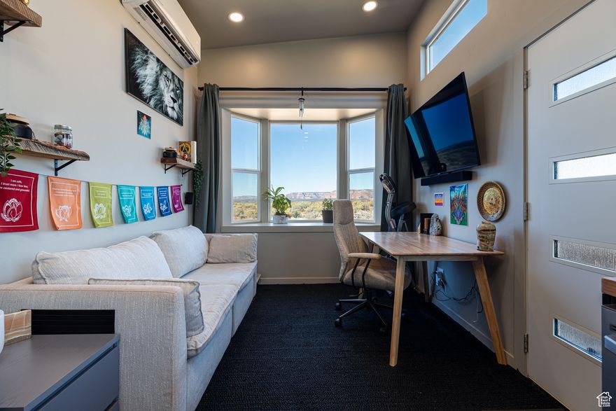 5 Acres with Sweeping Red Cliff Views | Zoned R-5 | STR-Friendly - Experience the beauty of Southern Utah from this stunning 5-acre parcel showcasing unobstructed red cliff views and endless possibilities. This property is fully equipped with electric, water, and a 1,500-gallon septic system, making it ready for your dream build. A sleek, modern RV (or tiny home per what lenders say) already sits on the property - perfect as a place to live comfortably while you build your future home at which time you can sell it and use the cash toward your stick-built home. Zoned R-5, this parcel allows two site-built homes of equal, offering exceptional flexibility for a private estate, family compound, or investment opportunity. A single short-term rental is permitted, and with a county conditional use permit, 2 residences can operate as dual STRs - a good option for those seeking income potential in a highly desirable area. Enjoy privacy, serenity, and the breathtaking natural scenery making this region so special - all while being minutes from town and outdoor adventure. Buyer to verify all. Separate mortgages may be required for the RV home and the land