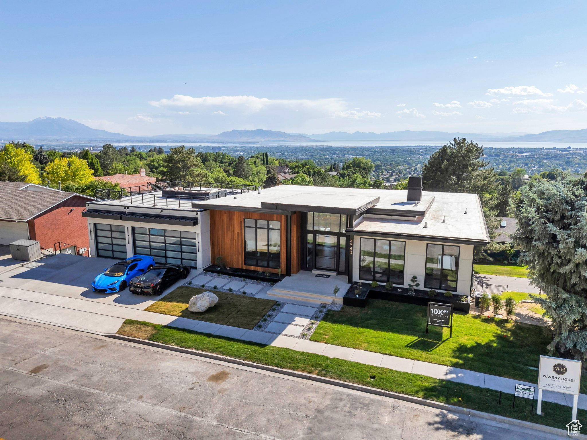 Experience modern luxury in this stunning Parade of Homes showcase by 10X Builders in Provo. Designed for comfort and entertainment, this home features incredible valley views, a private spa room with cold plunge and sauna, a swim spa, and a fully equipped workout room. Each bedroom has its own en-suite bath, and the primary suite includes heated floors for year-round comfort. Enjoy movie nights in the theater room, host guests in the bunk room, and take advantage of the separate 1 bed/1 bath apartment with private entrance. Impeccably crafted with attention to detail, this home is where wellness, design, and functionality come together.