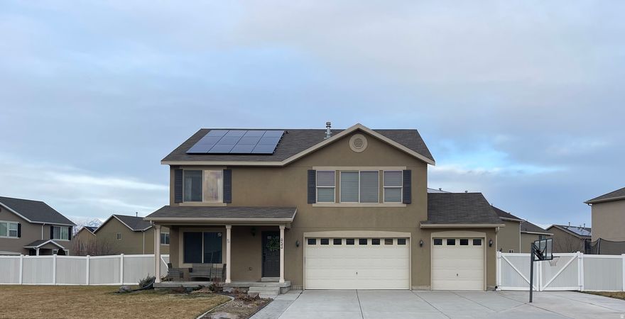 Move-in ready home with a detailed remodel throughout. Enjoy a beautifully refreshed interior featuring new cabinets and granite countertops in kitchen and bathrooms, new flooring and fresh paint on the main level. Spacious layout with large bedrooms, an oversized master suite, and plenty of storage-including a 1,300 sq. ft. crawl space that's 5 feet tall and easily accessible. Oversized 3-car garage, RV parking, and five raised garden beds ready for your green thumb. Fully fenced. Paid-off solar panels and irrigation water help keep utility costs low year-round.  Utilities in Lehi are much lower than other cities. Conveniently located near grocery stores, restaurants, and right across the street from the Jordan River Trail entrance-perfect for walks, biking, and outdoor recreation. The elementary bus stop is one house away. There is a very minimal HOA that is $45 a year that is only to help maintain the Jordan River Trail.