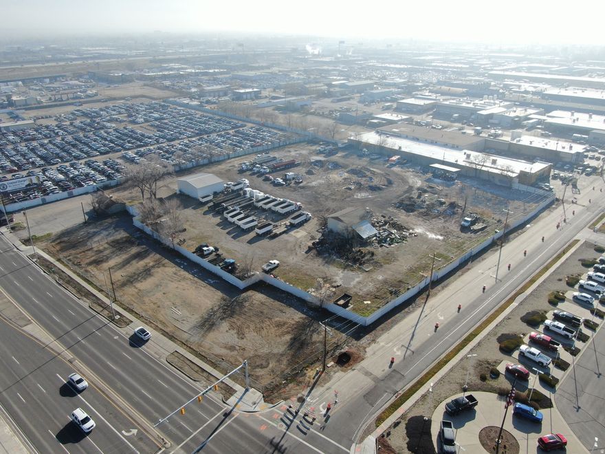 4.5 acres of flat, ready-to-use industrial outdoor storage land in Salt Lake City's South Valley submarket. Zoned LI (Light Industrial) with garage and storage shed included, this site offers immediate access to I-15 and SR-201, positioning tenants at the center of the Wasatch Front's industrial corridor. This property provides flexible outdoor storage for equipment, materials, or fleet operations.