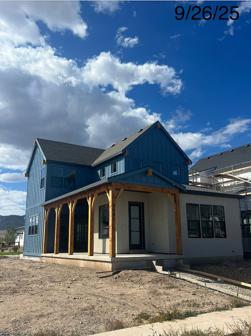 The Engelberg is a charming two-story home with 3,150 sq ft of warm, comfortable living. The main floor features an open-concept layout with a volume ceiling that blends the kitchen, dining, and living areas, perfect for everyday living and entertaining, and extends to a spacious outdoor patio complemented by a wrap-around front porch for seamless indoor-outdoor enjoyment. Upstairs, the private primary suite offers an en suite bathroom and walk-in closet for a peaceful retreat, while two additional bedrooms, thoughtfully separated from the primary, share a full bathroom to provide comfort and flexibility for family or guests. The Engelberg balances cozy, modern living with smart design in a welcoming layout.