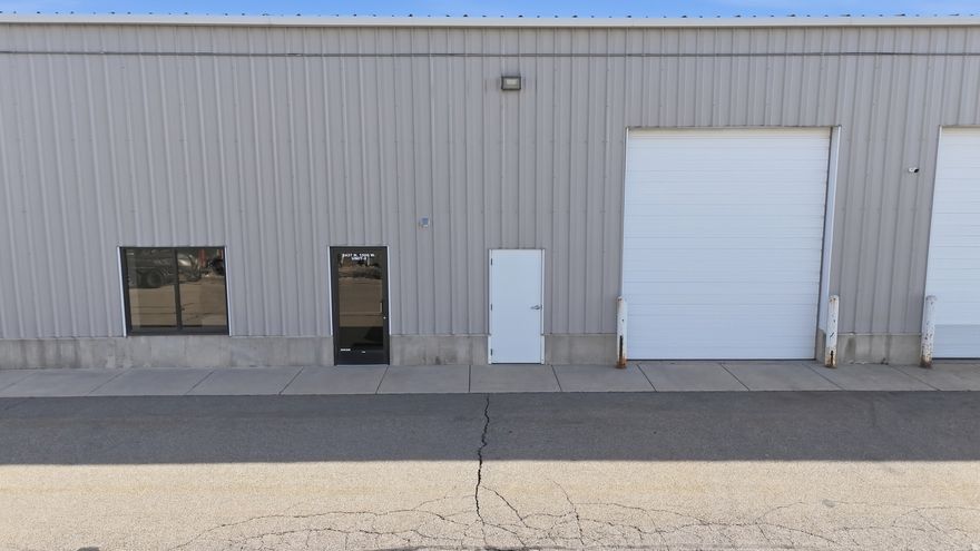 Rare opportunity to own a flex industrial condo minutes from I-15. This space offers 2,650 sf of office and warehouse space on the ground floor with an additional approximately 700 sf of usable mezzanine space with stair access. The unit features 20' ceilings, an at-grade roll-up door, a heated warehouse and dedicated parking for the unit. Measurements provided as an estimate, buyer to verify all information provided.