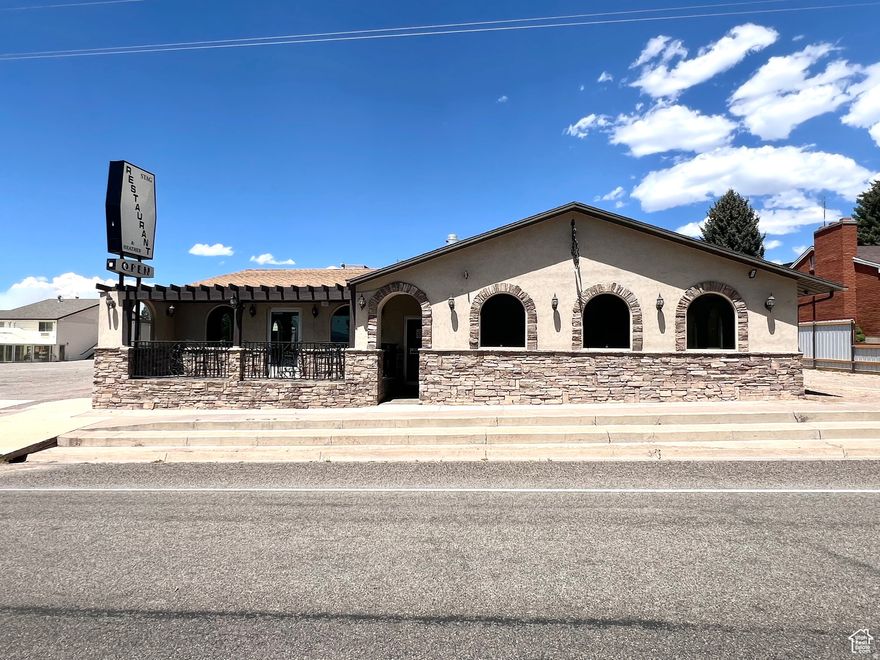 Turnkey restaurant opportunity in the heart of Bicknell, UT! This fully equipped and operational restaurant is move-in ready and includes everything needed to open for business immediately. Featuring a complete commercial kitchen with a dedicated bake center, triple-sink dishwashing station, walk-in fridge & freezer, large grill with burners, char broiler, deep fryer, fridges, freezers, plate warmer, espresso machine, and two drink stations. Interior includes two spacious dining areas, large guest restrooms (ADA compliant), employee restroom, private office, and an on-site 1 bed / 1 bath kitchenette unit. The restaurant comes fully stocked with tables, chairs, patio furniture, registers, refrigerated display cases/coolers, dishes, serving ware, cookware, and utensils and what you see is what you get. Three cooling units serve the building, each with its own thermostat. Both front and side entrances are handicap accessible. Property includes shared, recorded parking access with the neighboring hotel Don't miss this rare opportunity to own and operate a fully functioning restaurant in one of southern Utah's most scenic small towns!