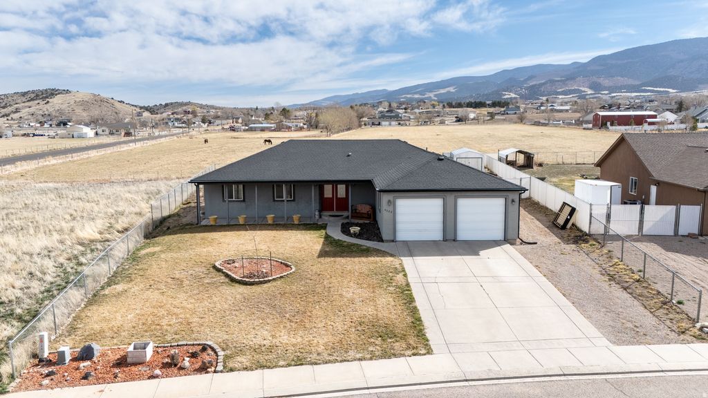 Photo of 5222 N TOMAHAWK DR, Enoch, UT 84721 (MLS # 2143510)