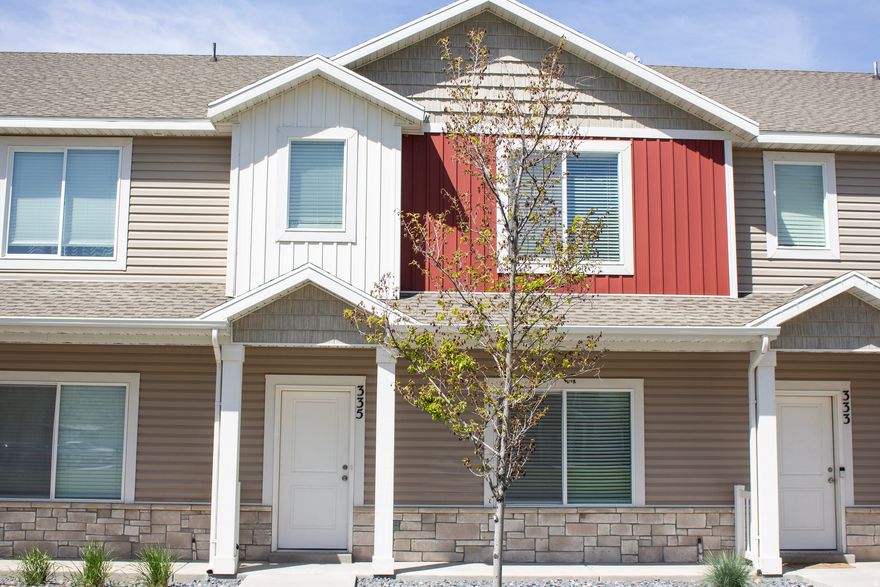 Beautiful townhome in the desirable Elk Mountain community! Features include an oversized, finished, 2-car garage, stainless steel appliances, granite countertops, upstairs laundry, under-stair storage, and a spacious primary suite with private bath. Front door opens to a large grassy area and playground. Community amenities include: clubhouse, pool, year-round hot tub, fitness center, spa, BBQ areas, and play spaces. Walking distance to Canyon Elementary, Mountain Crest HS, Blacksmith Fork Park, and free public transit. Park across the street offers pickleball, basketball, disc golf, baseball, trails, and more. Mountain views with easy access to hiking, fishing, and biking in Blacksmith Fork Canyon.