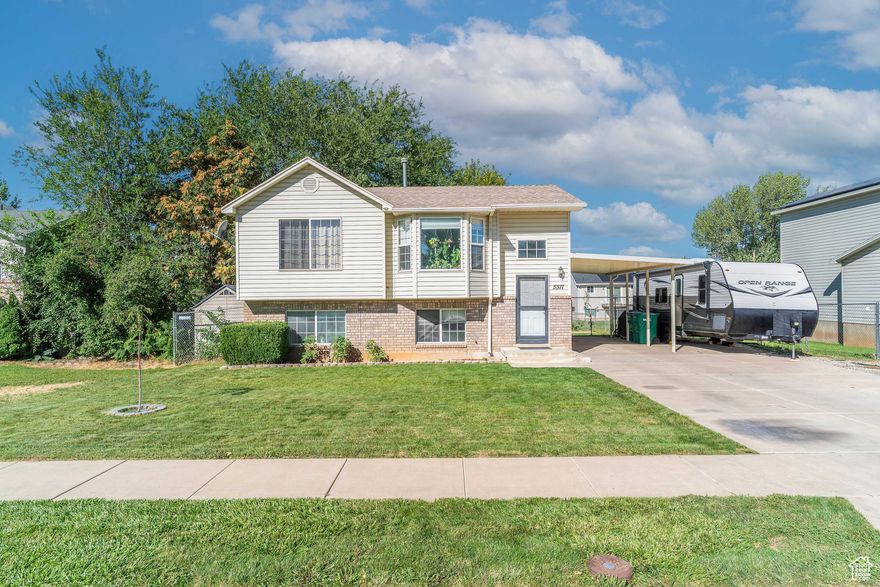 Charming split-entry in the heart of Roy! This 4-bed, 2-bath home offers 1,589 sq ft of living space with a fully finished basement, central air, and comfortable living areas. Enjoy a covered deck, patio, fenced yard, RV parking, and mountain views. Conveniently located near schools, shopping, and Hill AFB. Square footage figures are provided as a courtesy estimate only and were obtained from county records. Buyer is advised to obtain an independent measurement.