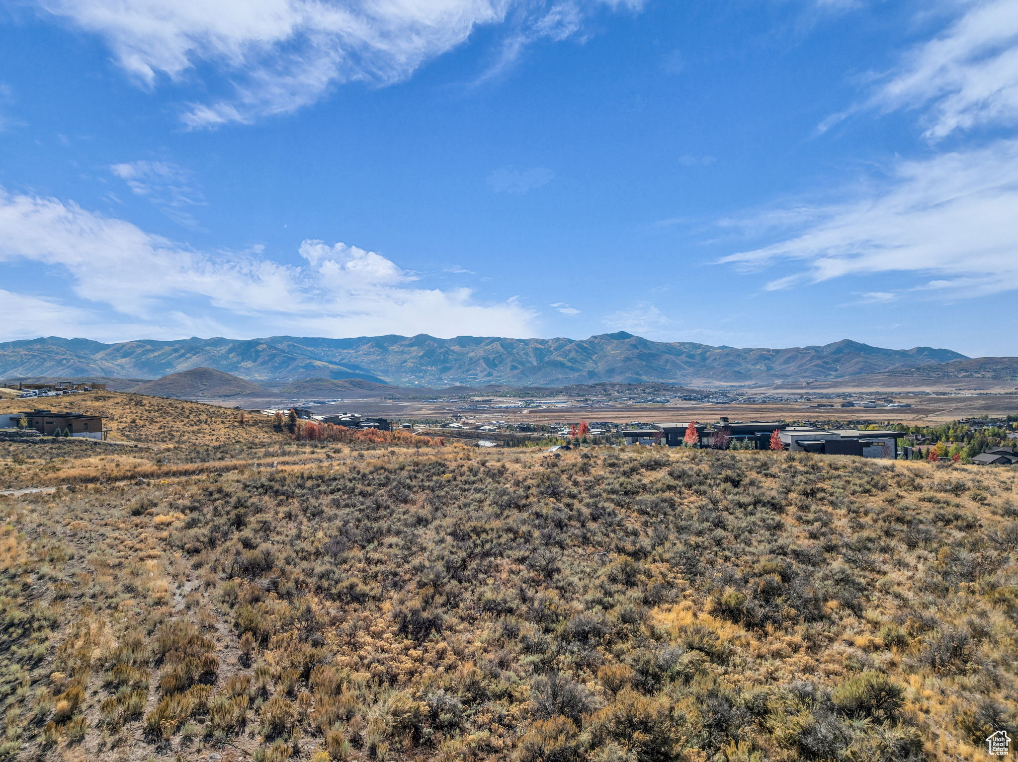GOLF MEMBERSHIP AVAILABLE. Situated in Promontory's, Elk Ridge Bluffs neighborhood, this 1.62 acre flat lot offers panoramic ski resort views & a large building envelope. Centrally located to the club amenities including the Hills golf course and Sage Restaurant, the Pete Dye golf course & club house, the Village facilities including pool, spa, gym, tennis, pickle ball, multiple restaurants, ice skating, kids cabin, and the Shed, which contains an indoor basketball court, bowling lanes, and a theater. Additional amenities include the Jack Nicklaus golf course, the Double Deer club house & Peak restaurant, the beach club, tubing hill, bocci ball, cross county skiing, soccer field, fishing pond, equestrian center, and the alpine lodges at Deer Valley & Park City mountains.