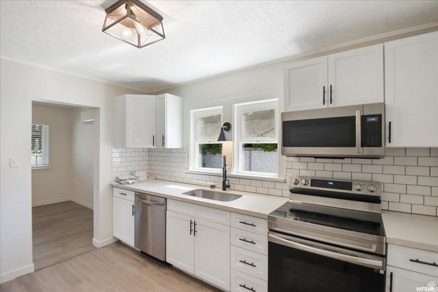 Photo of 1418 E 3900 S, Millcreek, UT 84124 (MLS # 2181768)